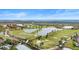 Aerial view of golf course and community at 10058 Crooked Creek Dr # 201, Venice, FL 34293
