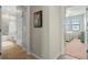 Hallway with access to two bedrooms and a bathroom at 10058 Crooked Creek Dr # 201, Venice, FL 34293