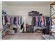 Large walk-in closet with ample hanging space and shelving at 10058 Crooked Creek Dr # 201, Venice, FL 34293