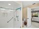 Bathroom with a walk-in shower and access to a bedroom at 1008 Burning Oak Ct, Venice, FL 34293