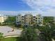 Aerial view of building and surrounding landscape at 10501 Amberjack Way # 103, Englewood, FL 34224