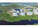 Wide aerial view of community and waterfront at 10501 Amberjack Way # 103, Englewood, FL 34224