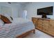 Spacious bedroom with a comfortable bed and plenty of storage at 10501 Amberjack Way # 103, Englewood, FL 34224