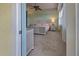 Bedroom with ensuite bathroom and a view at 10501 Amberjack Way # 103, Englewood, FL 34224