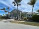 Community clubhouse with inviting exterior at 10501 Amberjack Way # 103, Englewood, FL 34224