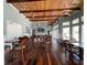 Community room with rustic wood floors and large windows at 10501 Amberjack Way # 103, Englewood, FL 34224