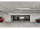 Indoor parking garage with designated parking spaces at 10501 Amberjack Way # 103, Englewood, FL 34224