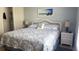 Main bedroom features a king bed and plenty of closet space at 112 Jose Gaspar Dr # 112, Englewood, FL 34223
