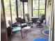 Enjoy your morning coffee in this sunroom with ample seating at 112 Jose Gaspar Dr # 112, Englewood, FL 34223