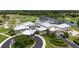 Community clubhouse with golf course and lake views at 1206 Tuscany Blvd, Venice, FL 34292