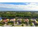Luxury home with pool, situated on a tranquil waterway with lush landscaping at 1206 Tuscany Blvd, Venice, FL 34292