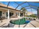 Large pool and spa with screened enclosure and patio furniture at 1206 Tuscany Blvd, Venice, FL 34292