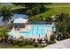 Community pool with patio and adjacent restrooms at 1206 Tuscany Blvd, Venice, FL 34292