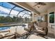 Relaxing lanai with pool and screened enclosure overlooking preserve at 1206 Tuscany Blvd, Venice, FL 34292