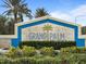 Grand Palm community entrance sign with landscaping at 12460 Shimmering Oak Cir, Venice, FL 34293