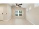 Bright dining area with tile floors and a ceiling fan at 12460 Shimmering Oak Cir, Venice, FL 34293