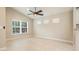 Spacious dining room with tile floors and large window at 12460 Shimmering Oak Cir, Venice, FL 34293