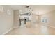 Kitchen with island and stainless steel appliances at 12460 Shimmering Oak Cir, Venice, FL 34293