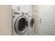 Laundry room with LG washer and dryer at 12460 Shimmering Oak Cir, Venice, FL 34293