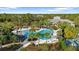 Community pool with water slide and cabana at 12460 Shimmering Oak Cir, Venice, FL 34293
