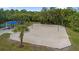 Outdoor sand volleyball court near tennis courts at 12460 Shimmering Oak Cir, Venice, FL 34293