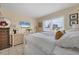 Spacious bedroom with a comfortable bed and plenty of natural light at 1285 Gulf Blvd # 3, Englewood, FL 34223