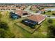 Aerial view showcasing a home with pool and fenced backyard at 12950 Basilica Dr, Venice, FL 34293