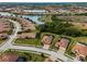 Community overview featuring lakefront homes and neighborhood at 12950 Basilica Dr, Venice, FL 34293