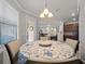 Breakfast nook with table and chairs, offering a view into the kitchen and Gathering room at 12950 Basilica Dr, Venice, FL 34293