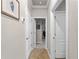 Hallway with access to additional rooms at 12950 Basilica Dr, Venice, FL 34293