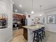 Modern kitchen with granite countertops and stainless steel appliances at 12950 Basilica Dr, Venice, FL 34293