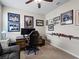 Home office with desk, computer, seating, and sports memorabilia at 12950 Basilica Dr, Venice, FL 34293