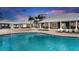 Resort-style pool with clubhouse and lounge area at 13237 Satin Lily Dr, Riverview, FL 33579