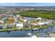Aerial view of waterfront community with luxury homes and boats at 1371 Grebe Dr, Punta Gorda, FL 33950