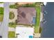 Aerial view of house, pool, and private boat dock on the canal at 1371 Grebe Dr, Punta Gorda, FL 33950