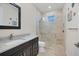 Bathroom with shower, toilet and single vanity at 1371 Grebe Dr, Punta Gorda, FL 33950