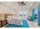 Bright bedroom with king-size bed and access to patio at 1371 Grebe Dr, Punta Gorda, FL 33950