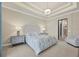 Luxurious main bedroom with en-suite bathroom and sitting area at 1371 Grebe Dr, Punta Gorda, FL 33950