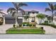 Stunning waterfront home with a modern design, landscaped yard, and a two-car garage at 1371 Grebe Dr, Punta Gorda, FL 33950