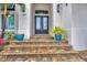 Front entrance with double doors and stone steps at 1371 Grebe Dr, Punta Gorda, FL 33950