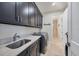 Laundry room with washer, dryer and sink at 1371 Grebe Dr, Punta Gorda, FL 33950