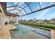 Inviting pool and spa with a covered lanai overlooking the canal at 1371 Grebe Dr, Punta Gorda, FL 33950