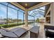Stunning pool and lanai with seating area and breathtaking water views at 1371 Grebe Dr, Punta Gorda, FL 33950