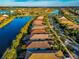 Aerial view of houses along a canal at 13836 Alafaya St, Venice, FL 34293
