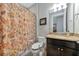 Bathroom with shower, toilet, and vanity with granite countertop at 13836 Alafaya St, Venice, FL 34293