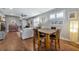 Casual dining area with a wood table and four chairs at 13836 Alafaya St, Venice, FL 34293
