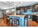 Modern kitchen with stainless steel appliances and granite countertops at 13836 Alafaya St, Venice, FL 34293