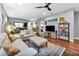 Open living room with hardwood floors and ample natural light at 13836 Alafaya St, Venice, FL 34293