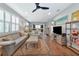 Living room features hardwood floors and neutral color palette at 13836 Alafaya St, Venice, FL 34293