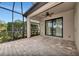 Covered patio with sliding doors and a ceiling fan at 13836 Alafaya St, Venice, FL 34293